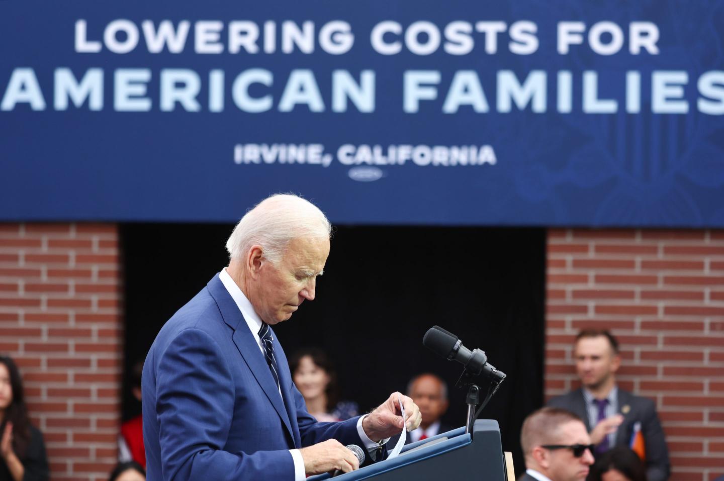 U.S. President Joe Biden stands after delivering remarks on lowering costs for American families at Irvine Valley College in Orange County on October 14, 2022 in Irvine, California.