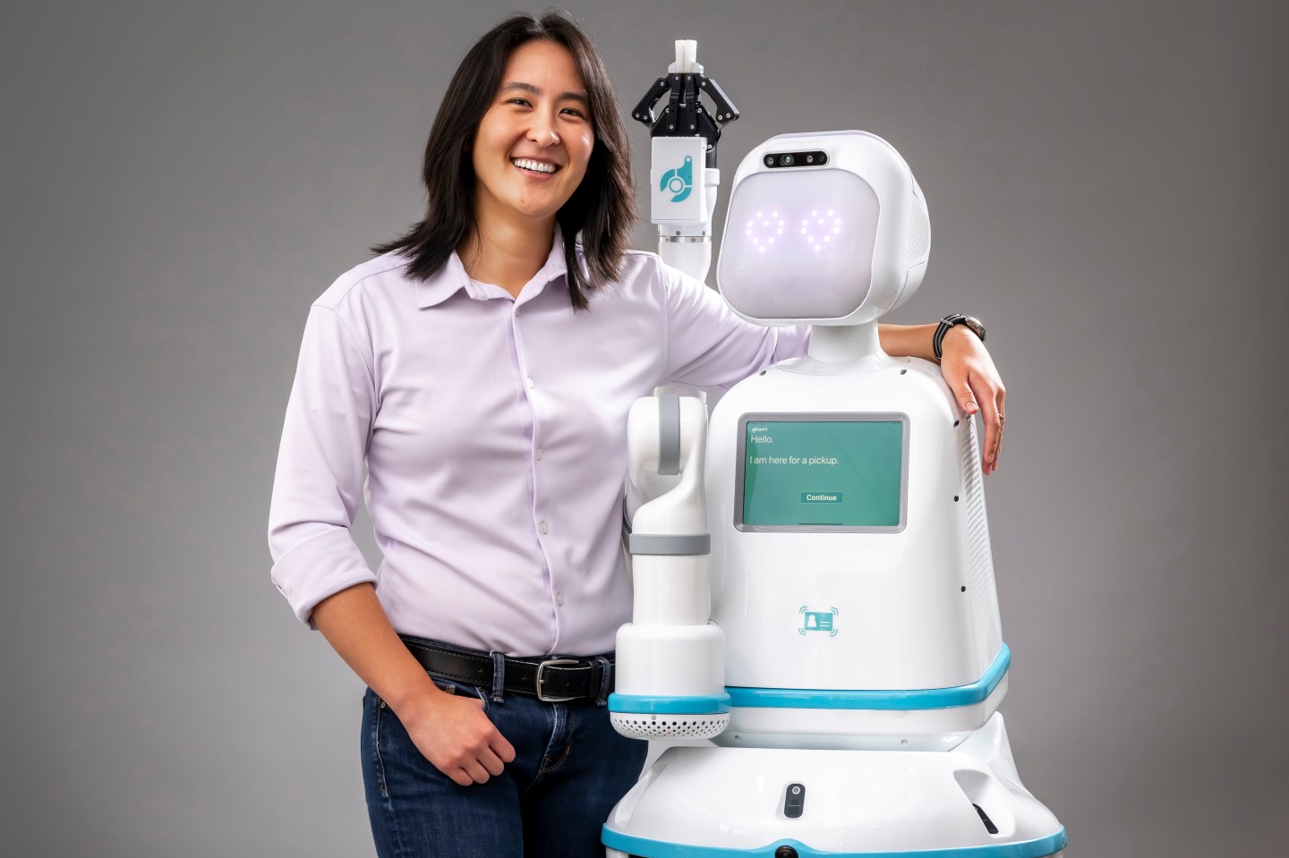 Diligent Robotics chief technology officer and co-founder Vivian Chu with Moxi, the company's hospital robot.