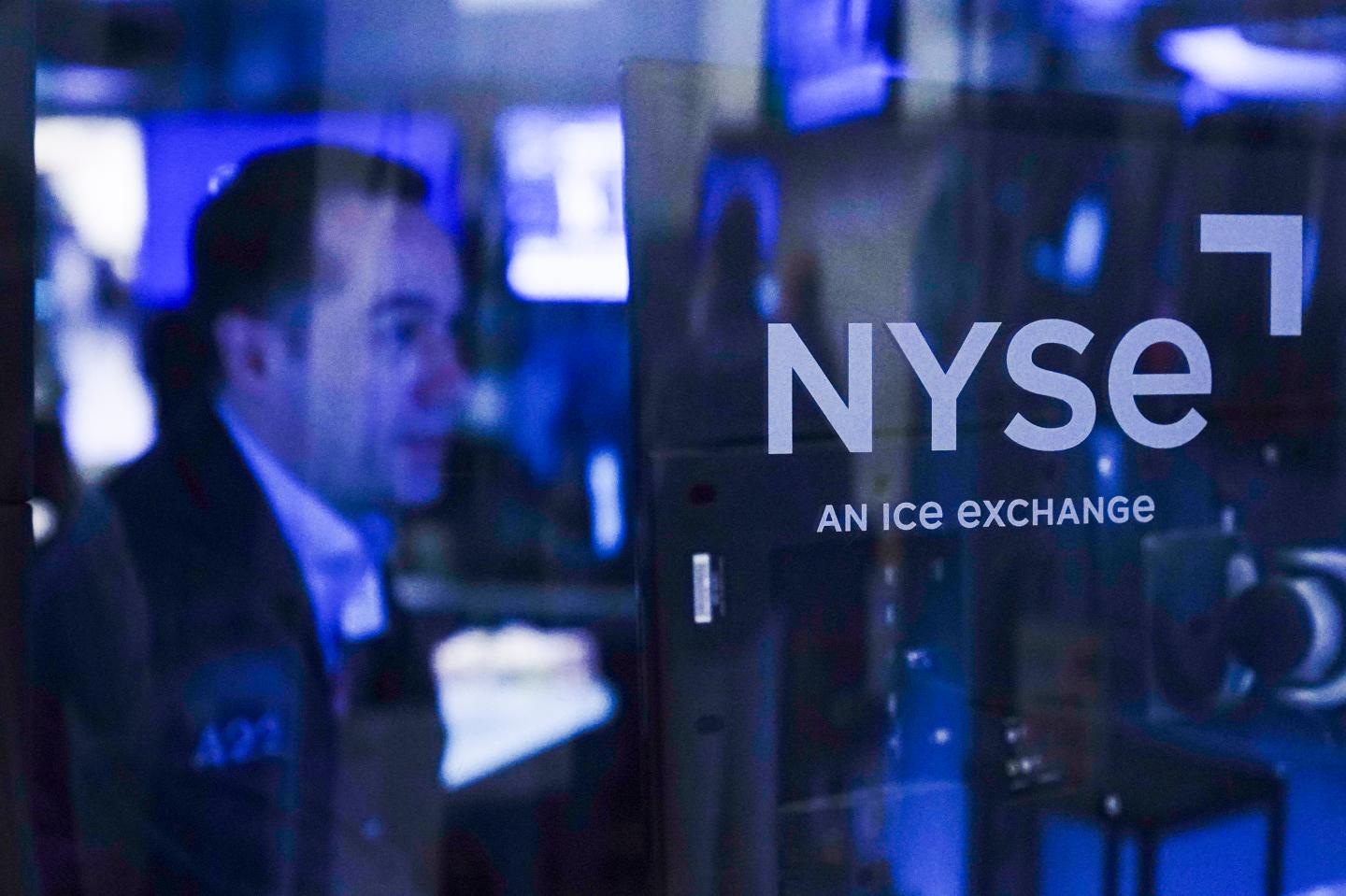A trader at the New York Stock Exchange