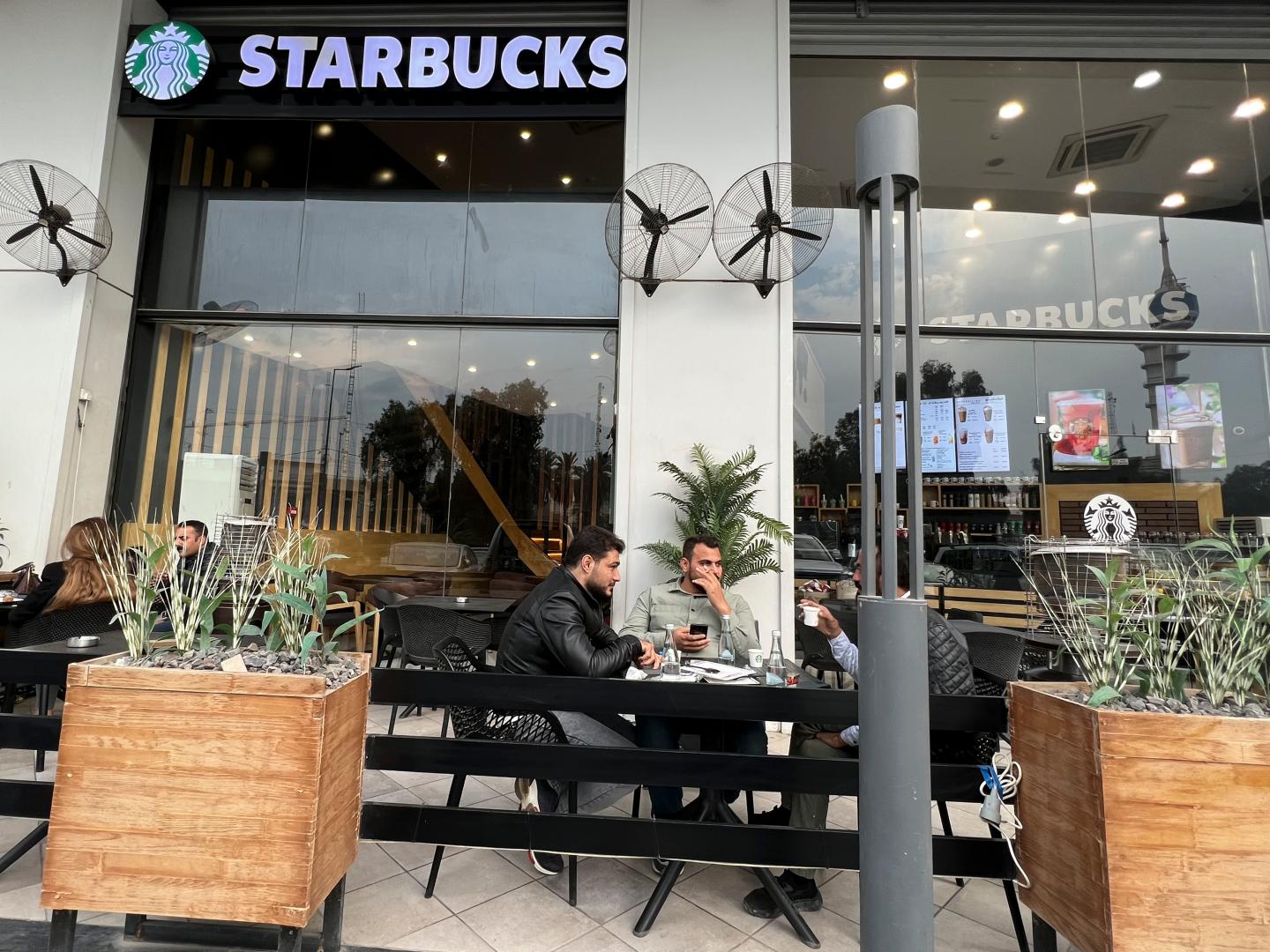 3 Starbucks stores in Iraq use real company merchandise down to the napkins. Thing is, they have nothing to do with the chain