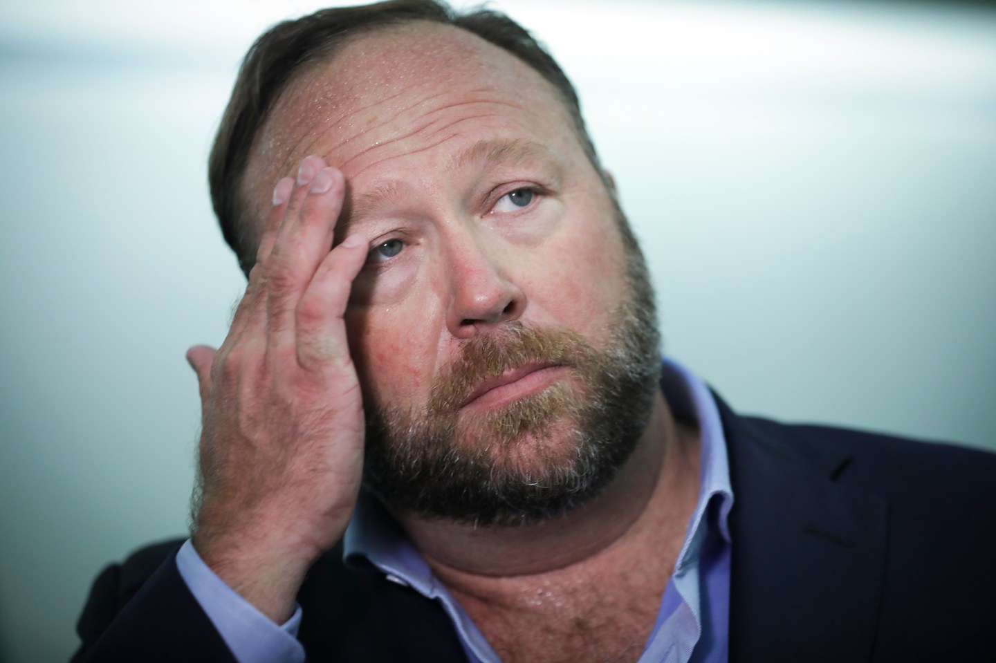 Conspiracy theorist Alex Jones filed for Chapter 11 bankruptcy Friday.
