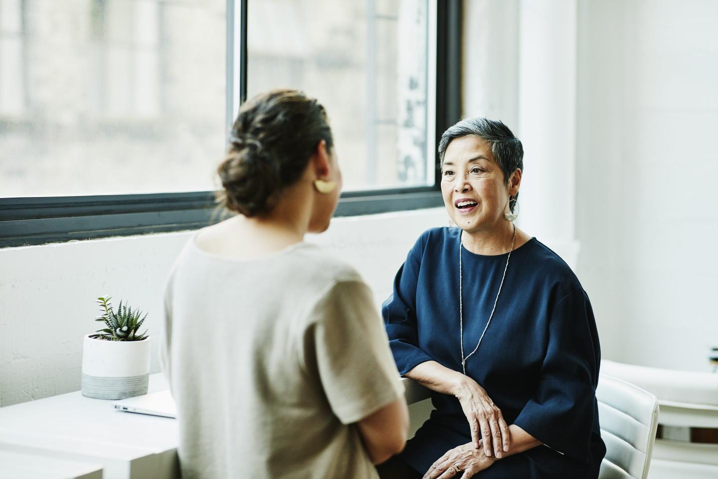 women having conversation