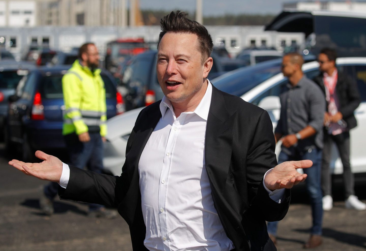Elon Musk gestures at the constuction site for Tesla's Berlin factory in 2020