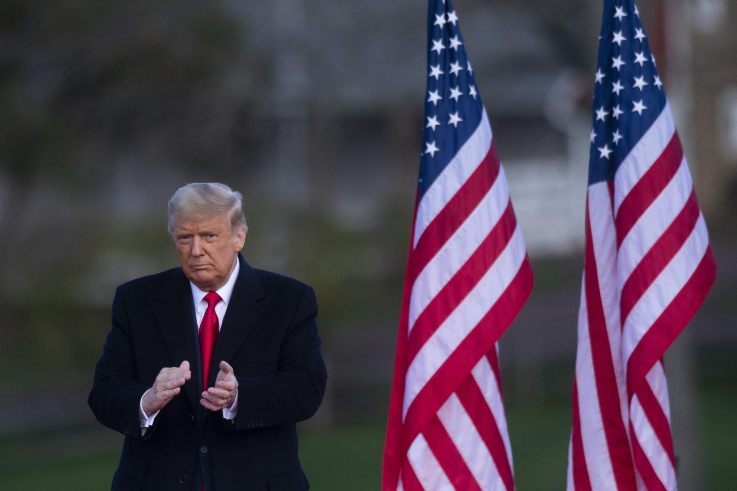 Donald Trump acknowledges supporters after holding a campaign rally