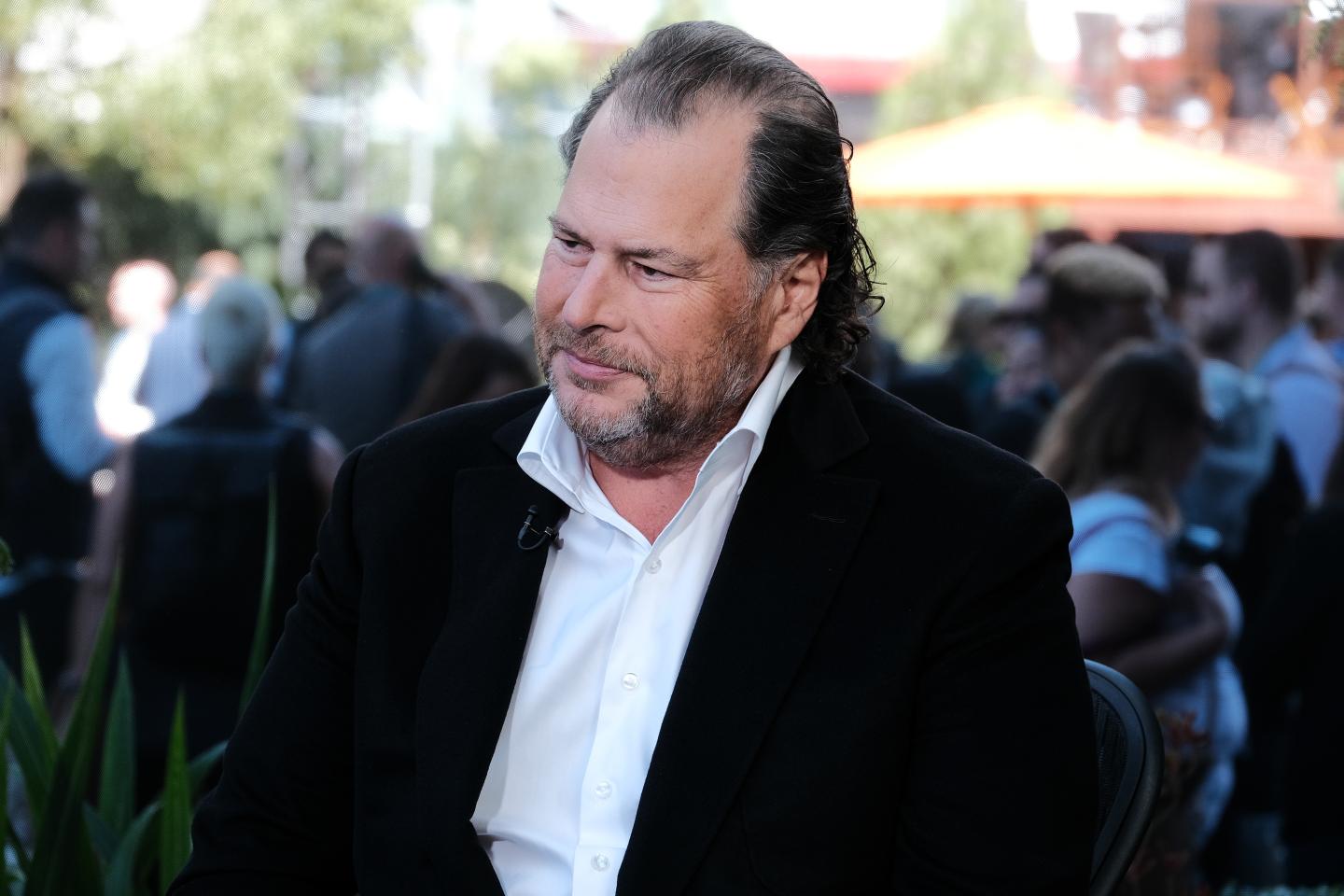 CEO of Salesforce Marc Benioff sitting in an interview with a black suit