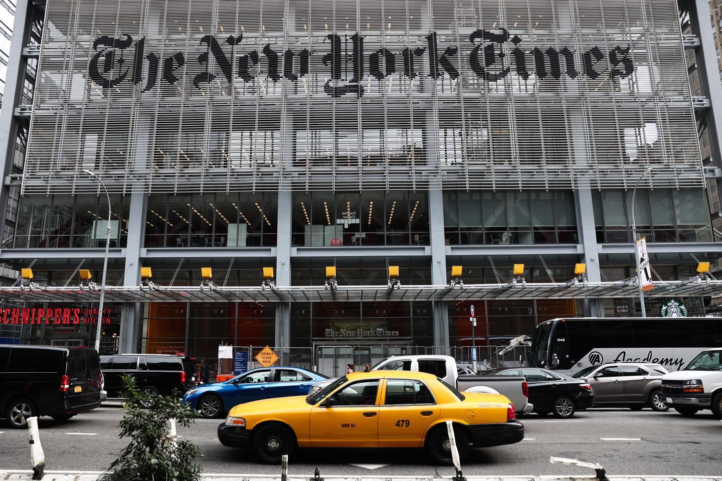 The New York Times logo is seen on the building in New York City