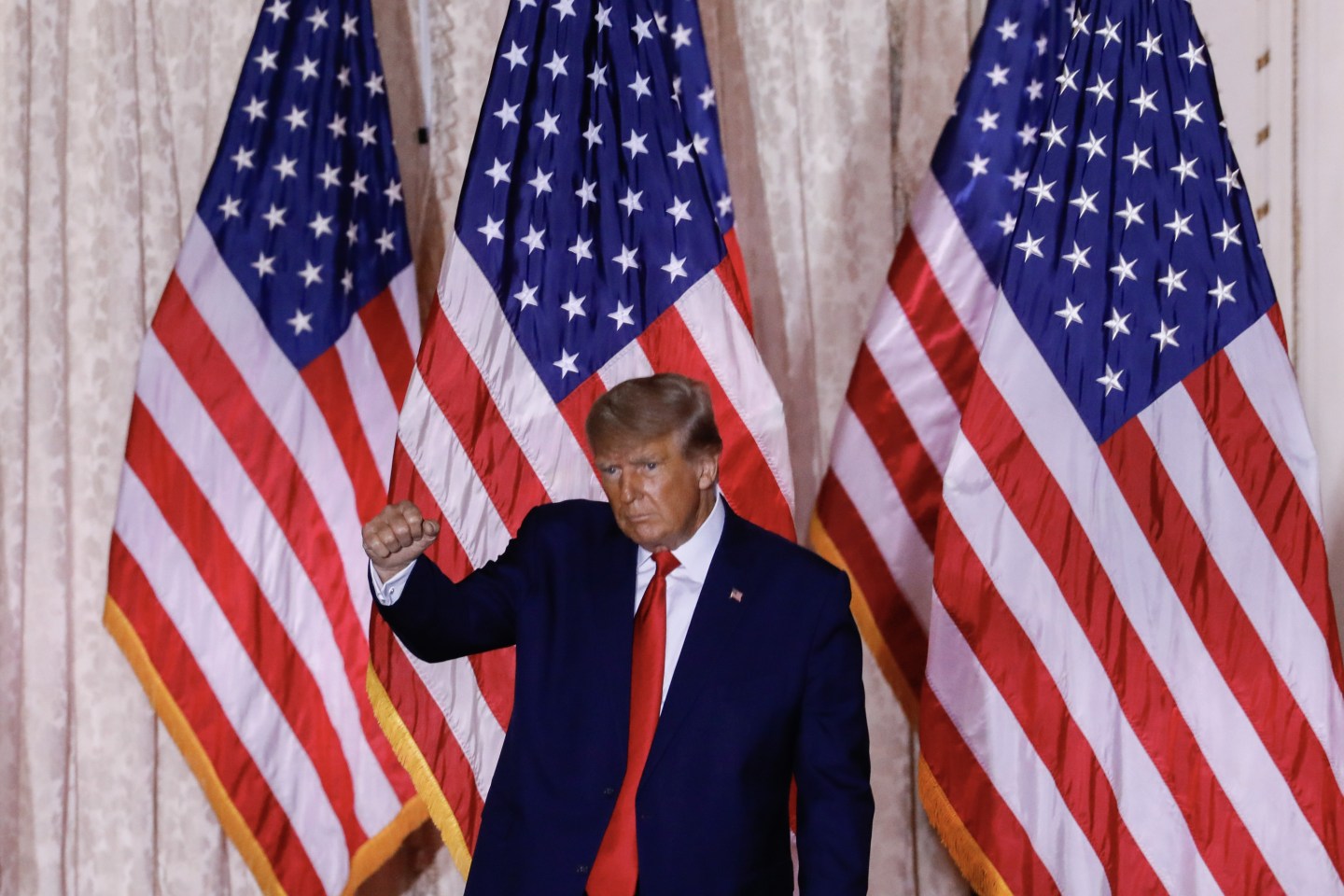 Former U.S. President Donald Trump gestures after speaking at the Mar-a-Lago Club in Palm Beach, Fla., on Nov. 15, 2022.