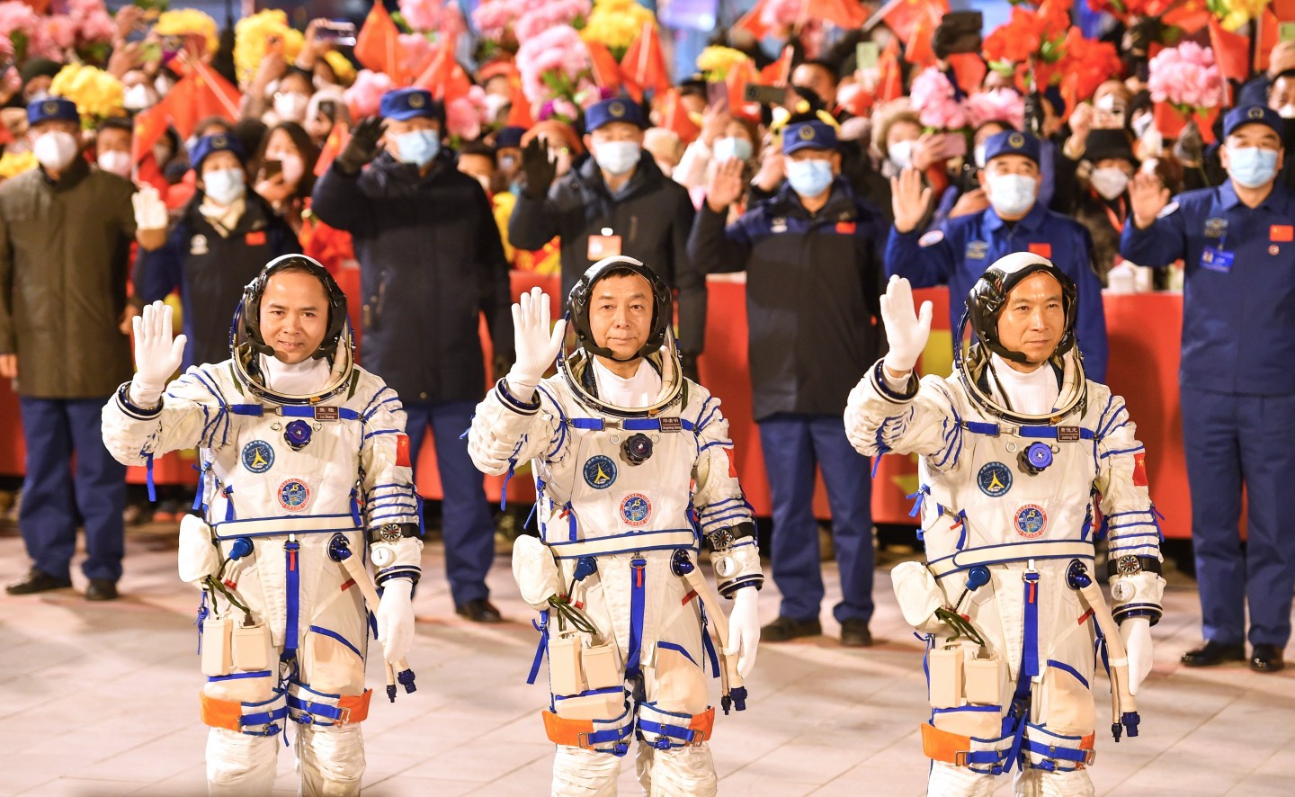 Three Chinese astronauts getting ready for the Shenzhou-15 manned space mission.