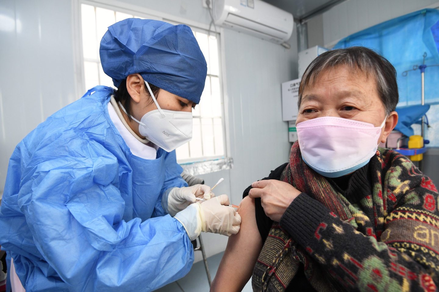 Woman gets a COVID vaccination in Guizhou province, China