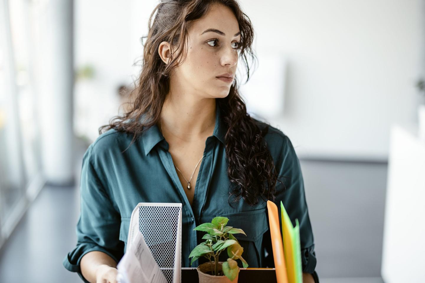 An employee leaving office with belongings