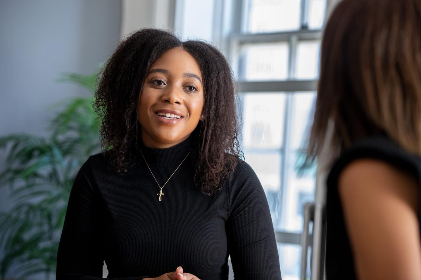 Woman asking her boss for a raise