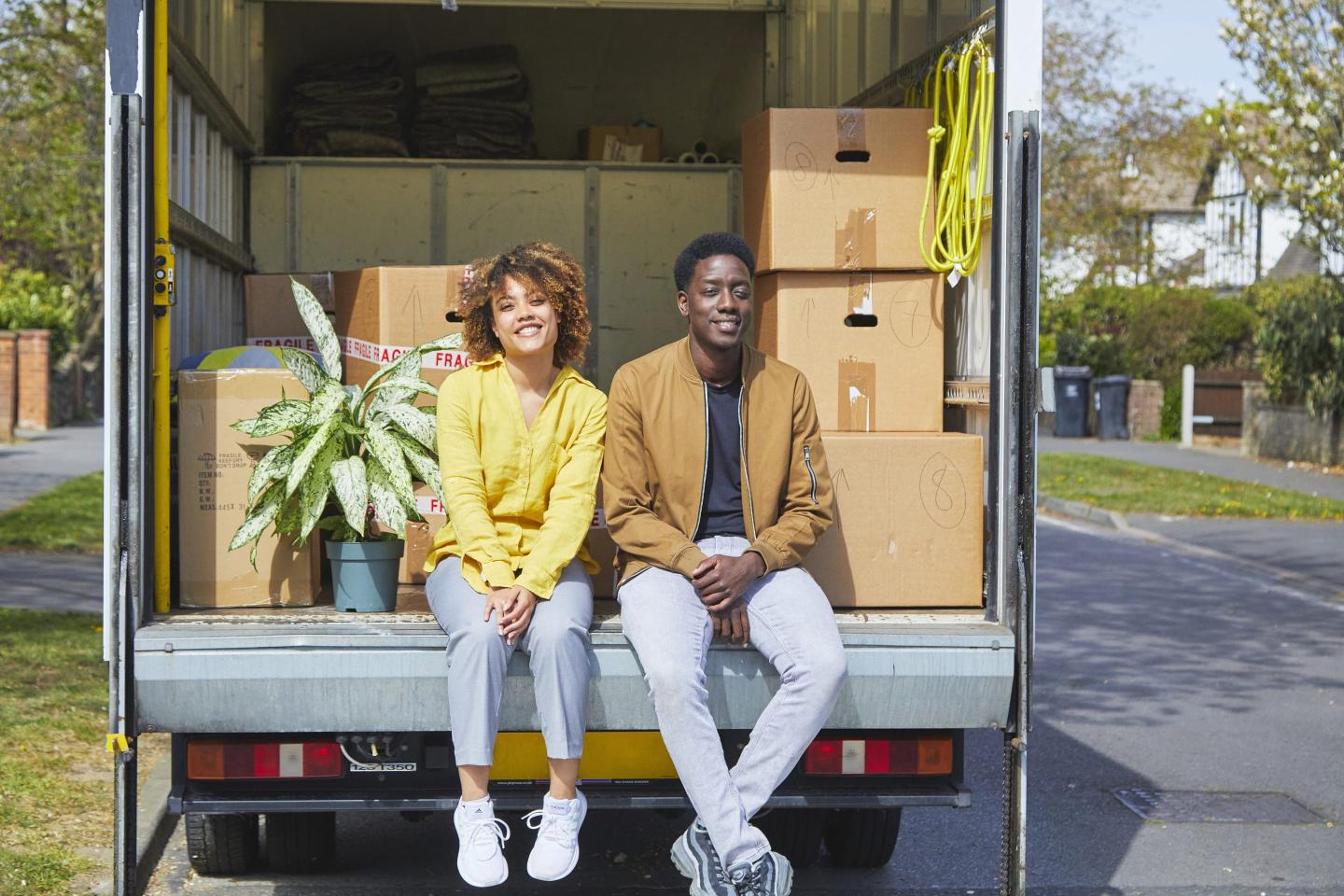 Young couple moving into a new house