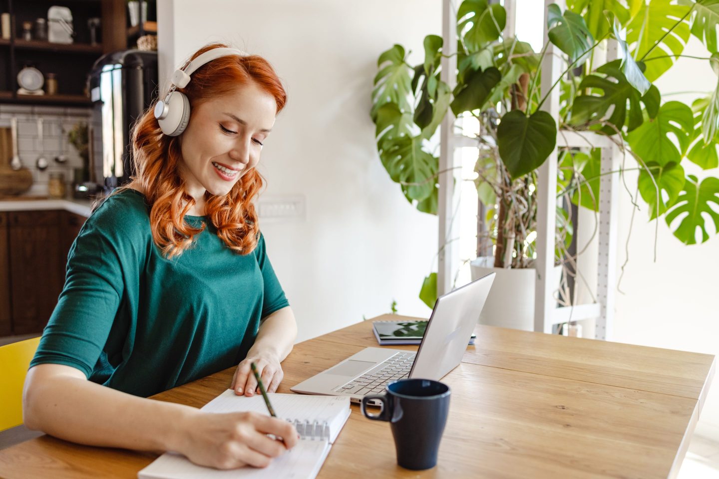 Caucasian women use laptop at home and concentrate on work