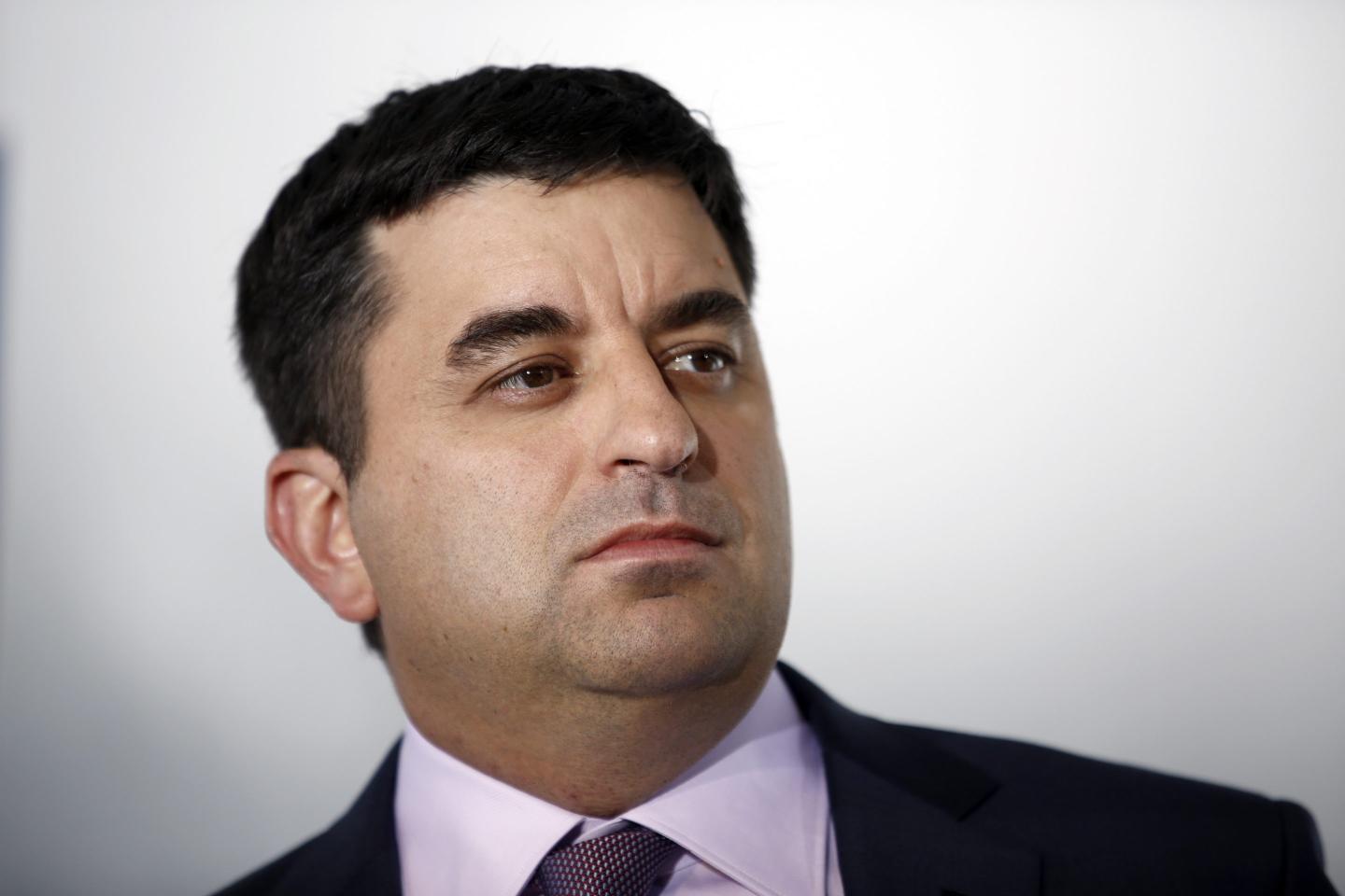 Gregory "Greg" Jensen, co-chief executive officer of Bridgewater Associates, pauses during a Bloomberg Television interview on day three of the World Economic Forum (WEF) in Davos, Switzerland, on Friday, Jan. 23, 2015.