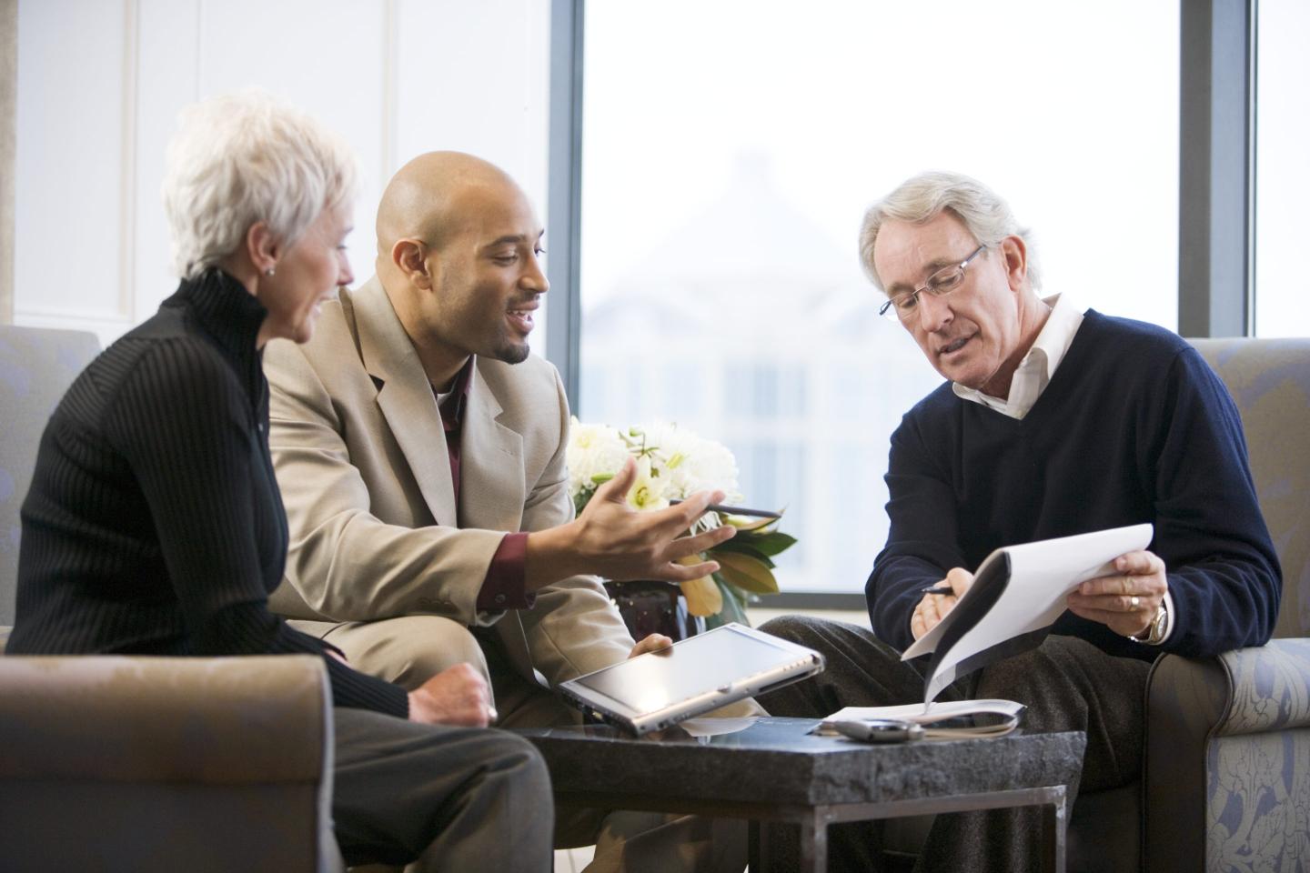 Senior couple meeting with financial adviser