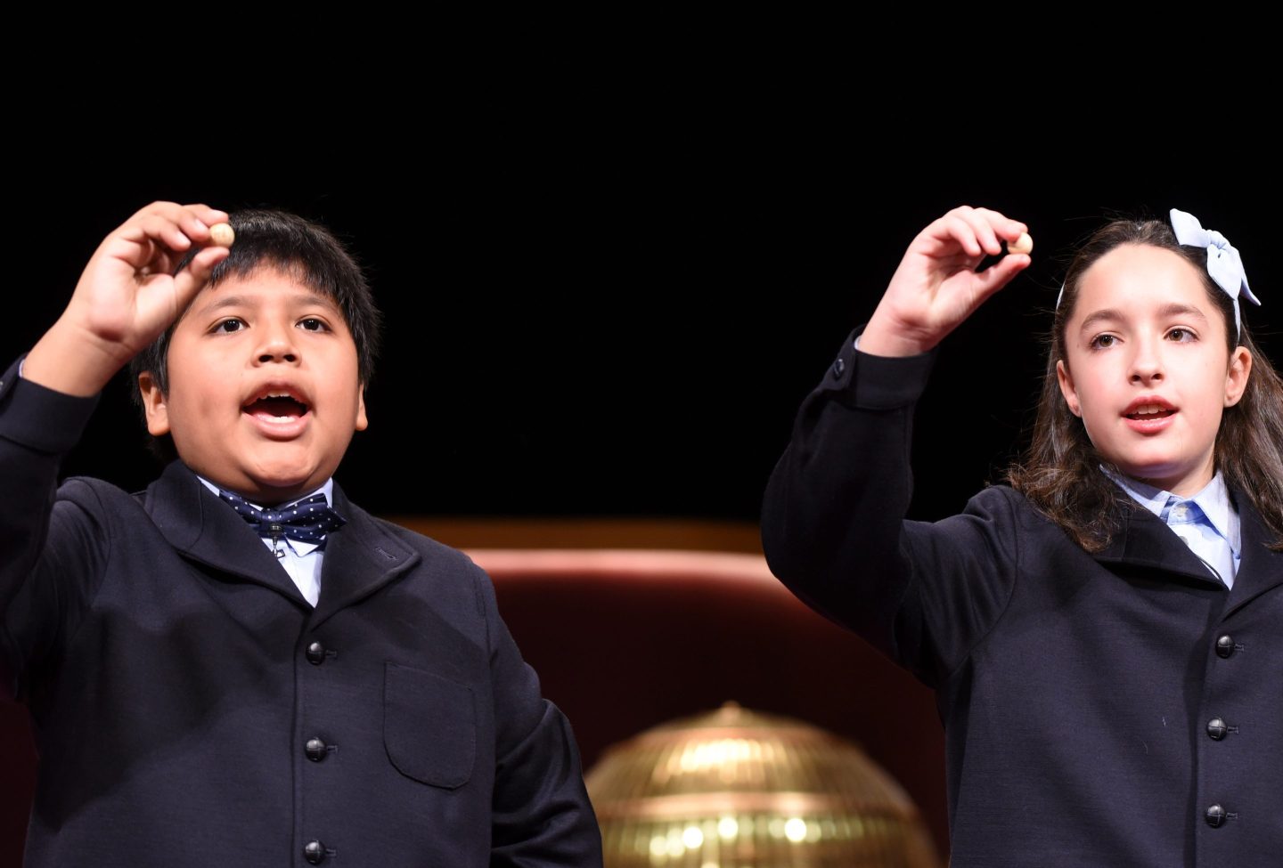Children sing out a number in Spain's Christmas lottery.
