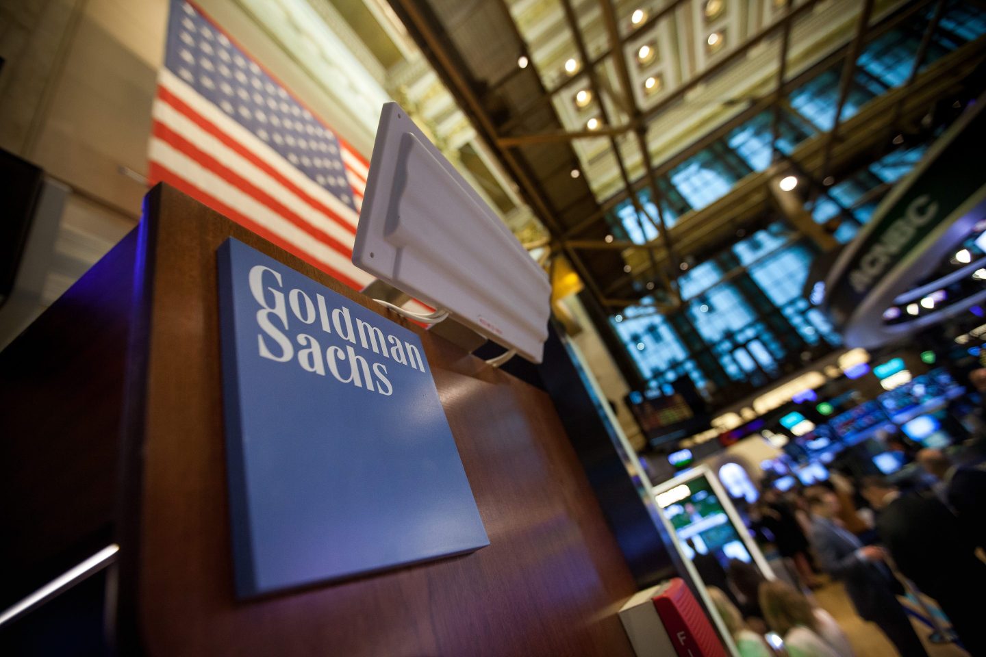Goldman Sachs Group Inc. signage is displayed at the company's booth on the floor of the New York Stock Exchange (NYSE) in New York, U.S.,