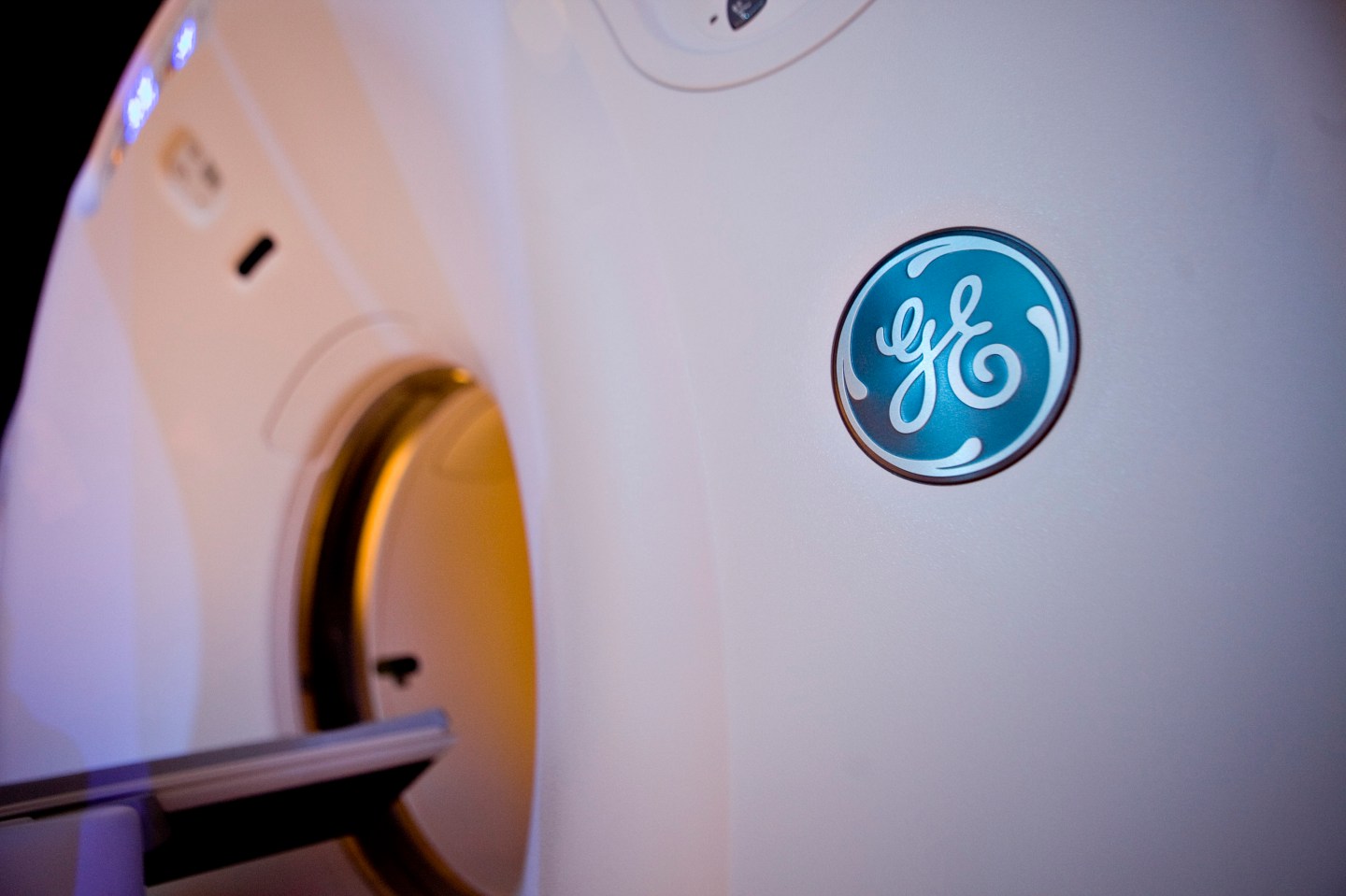 A General Electric Co. logo is seen on the side of a Discovery CT750 HD CT scan machine as it sits on display