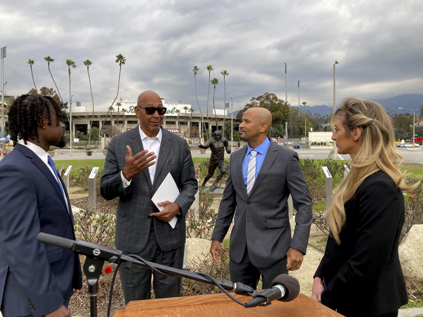 California lawmakers ad sports players gather round to talk.