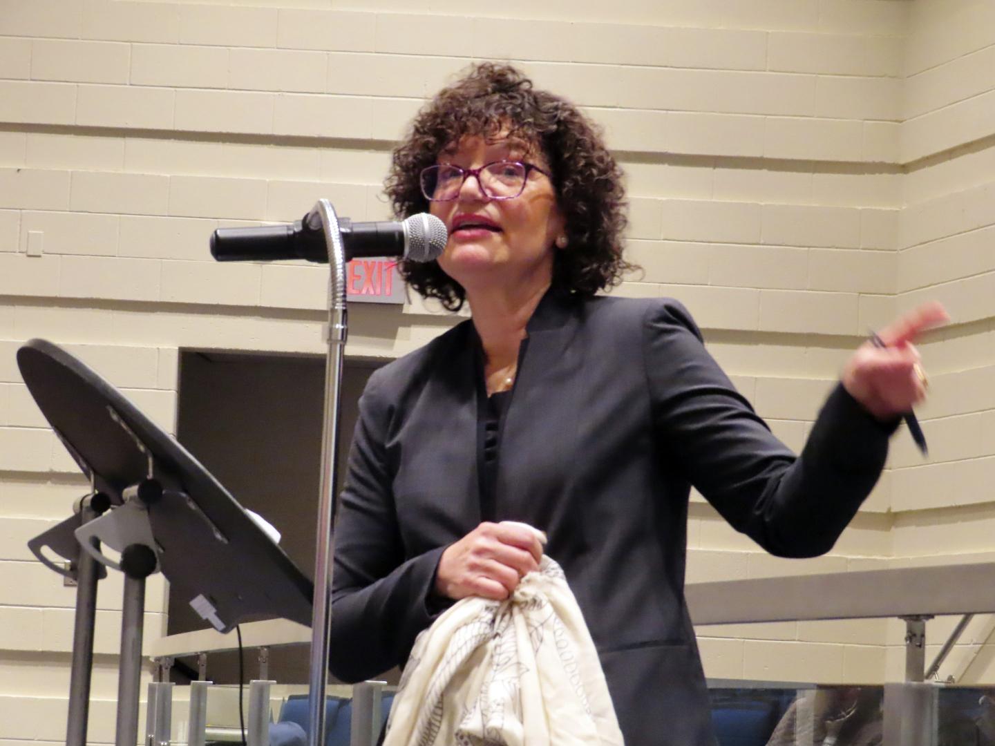 Janet Tauro, an environmental activist, speaks at a public meeting on Wednesday, Jan., 25, 2023, in Toms River, N.J., about a proposed settlement between the New Jersey Department of Environmental Protection and BASF Corp to restore natural resources that were damaged by the operations of the former Ciba Geigy chemical plant.