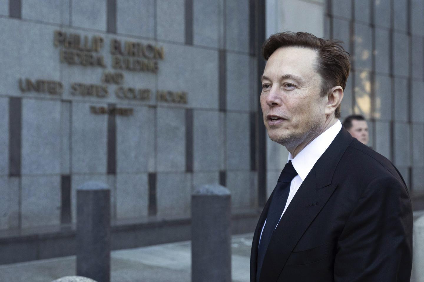 Elon Musk departs the Phillip Burton Federal Building and United States Court House in San Francisco, on Tuesday, Jan. 24, 2023.