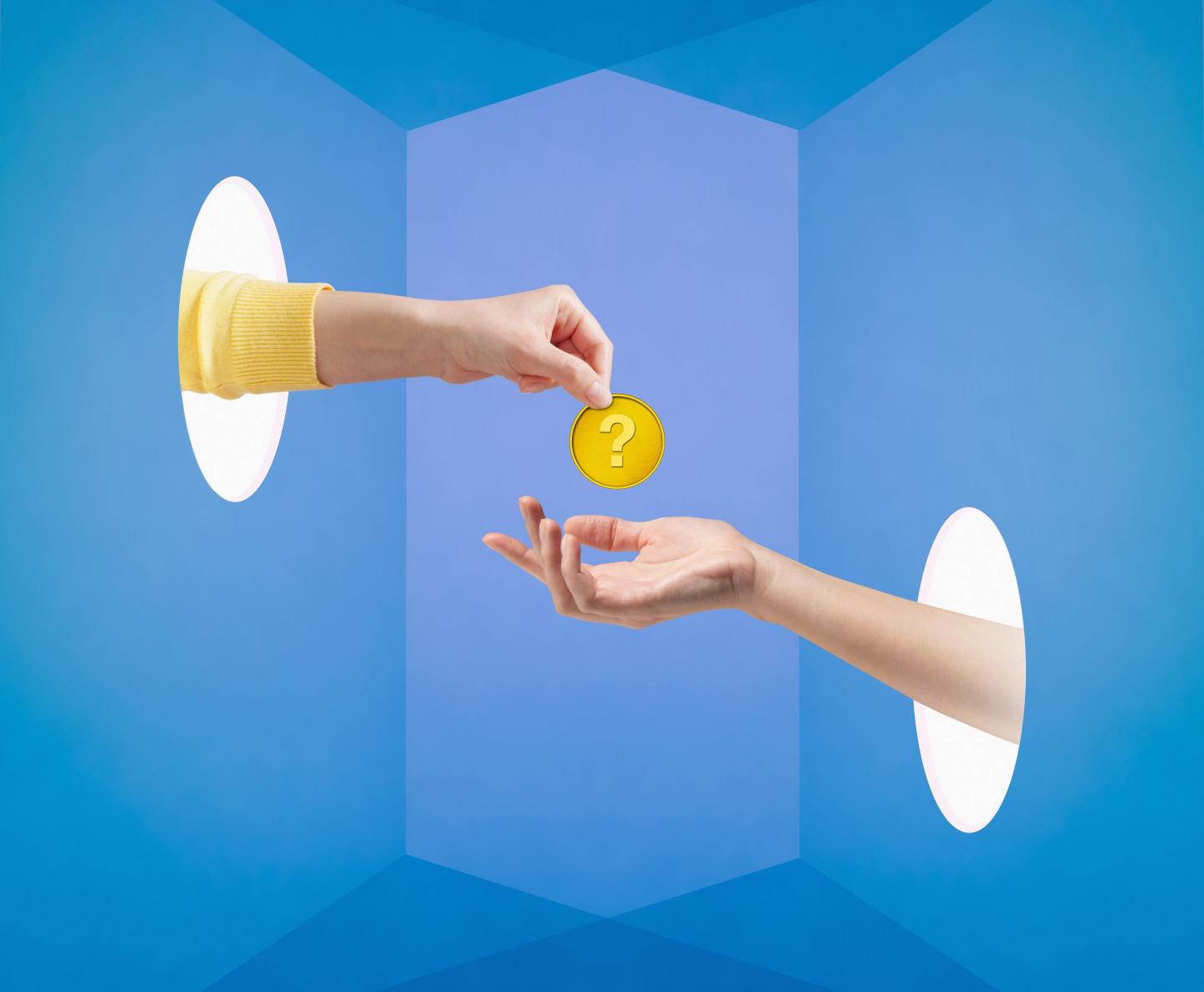 Two hands exchanging money
