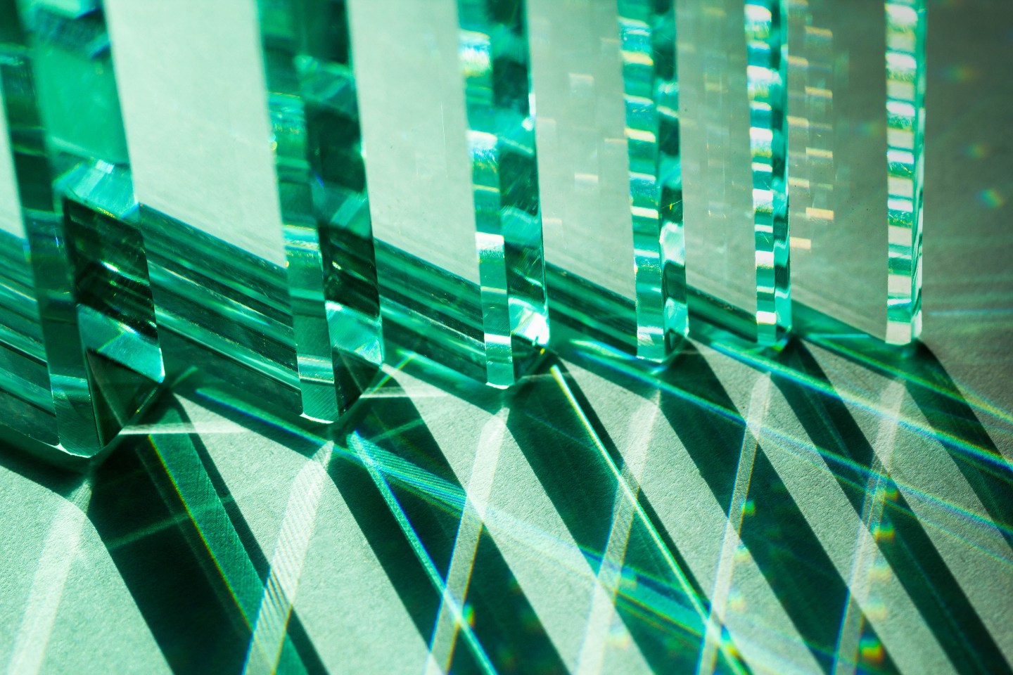 light passes through the reflection of a glass.