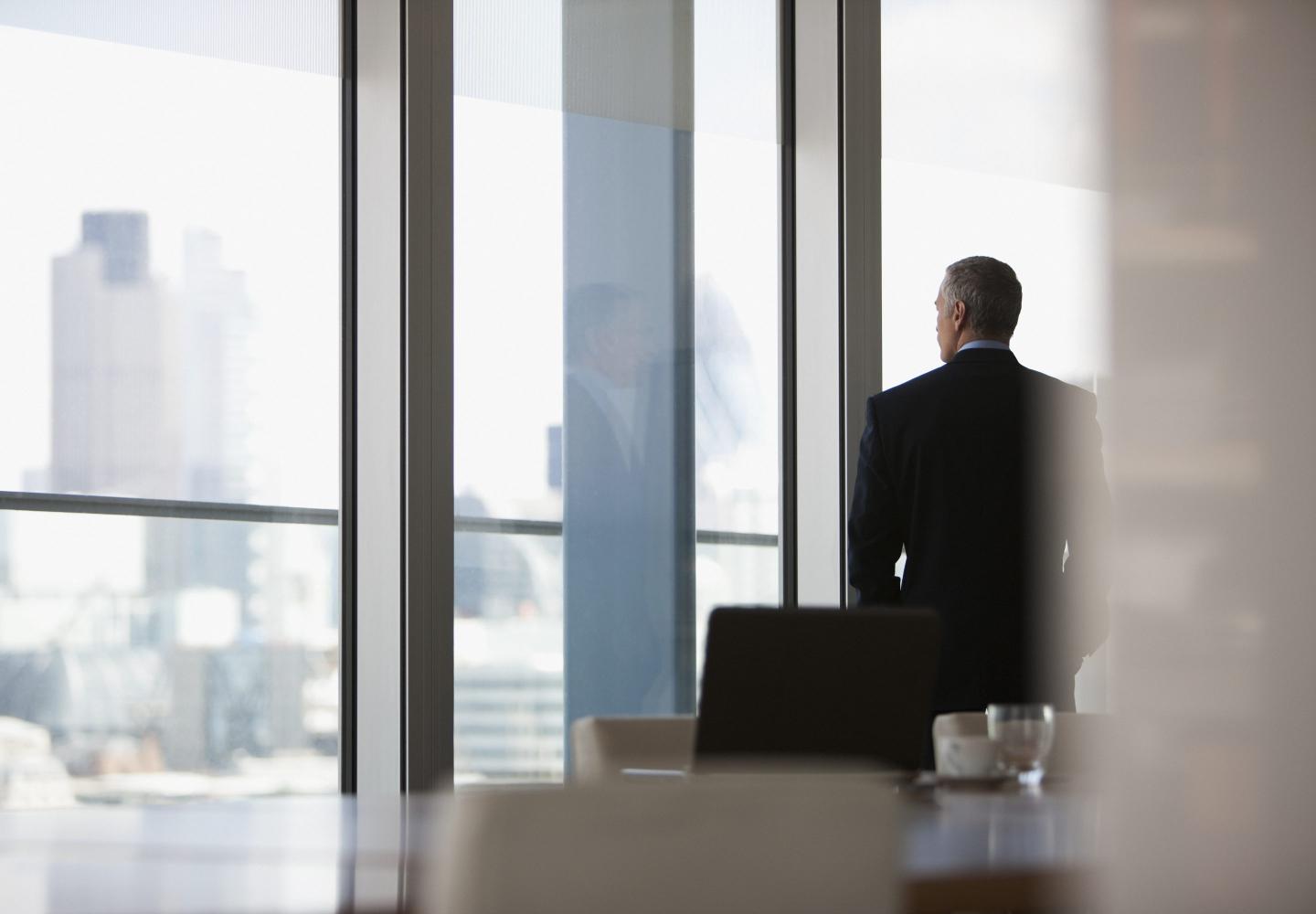 CEO stares out window