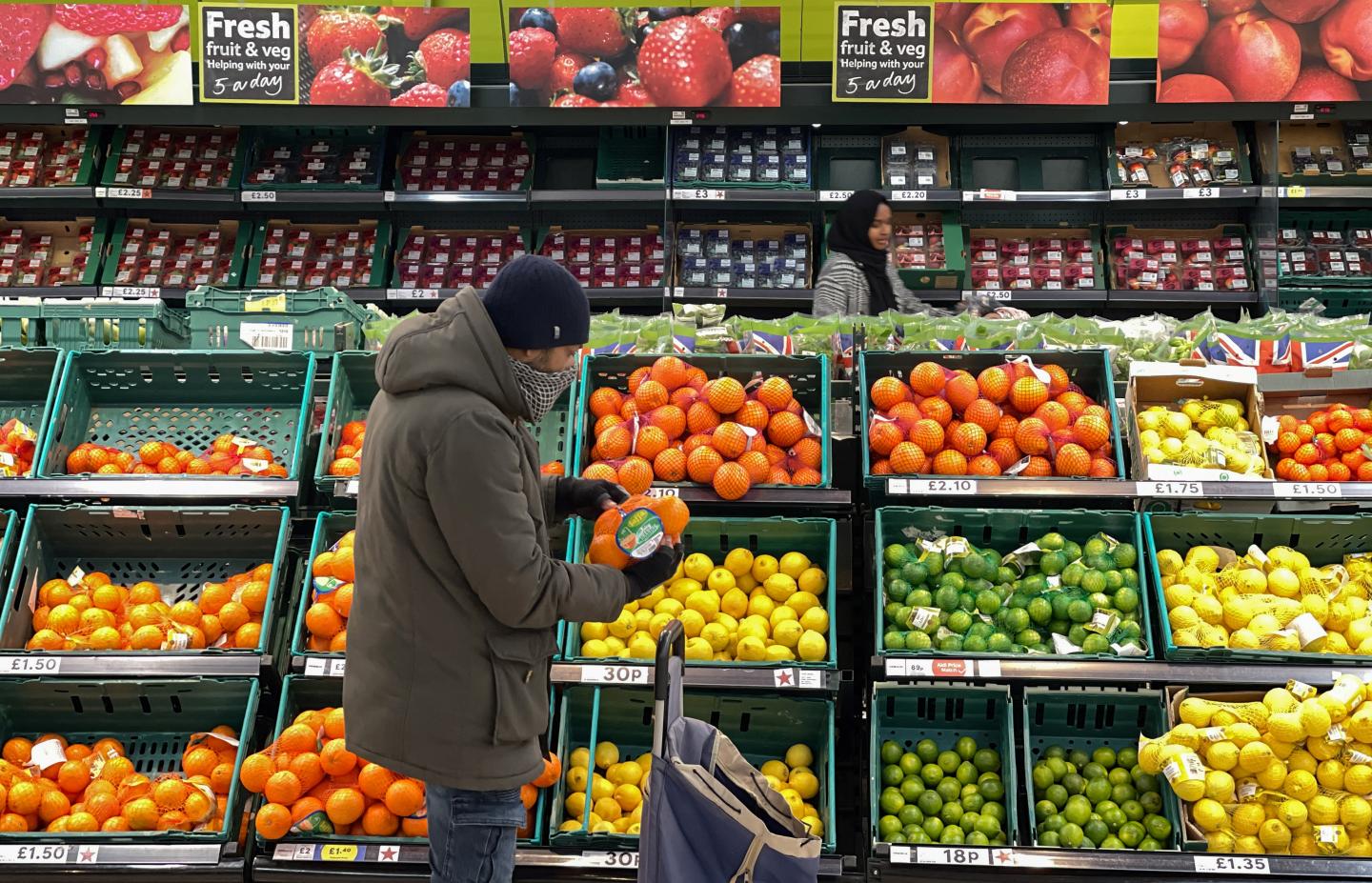 A customer shops in a grocery store.
