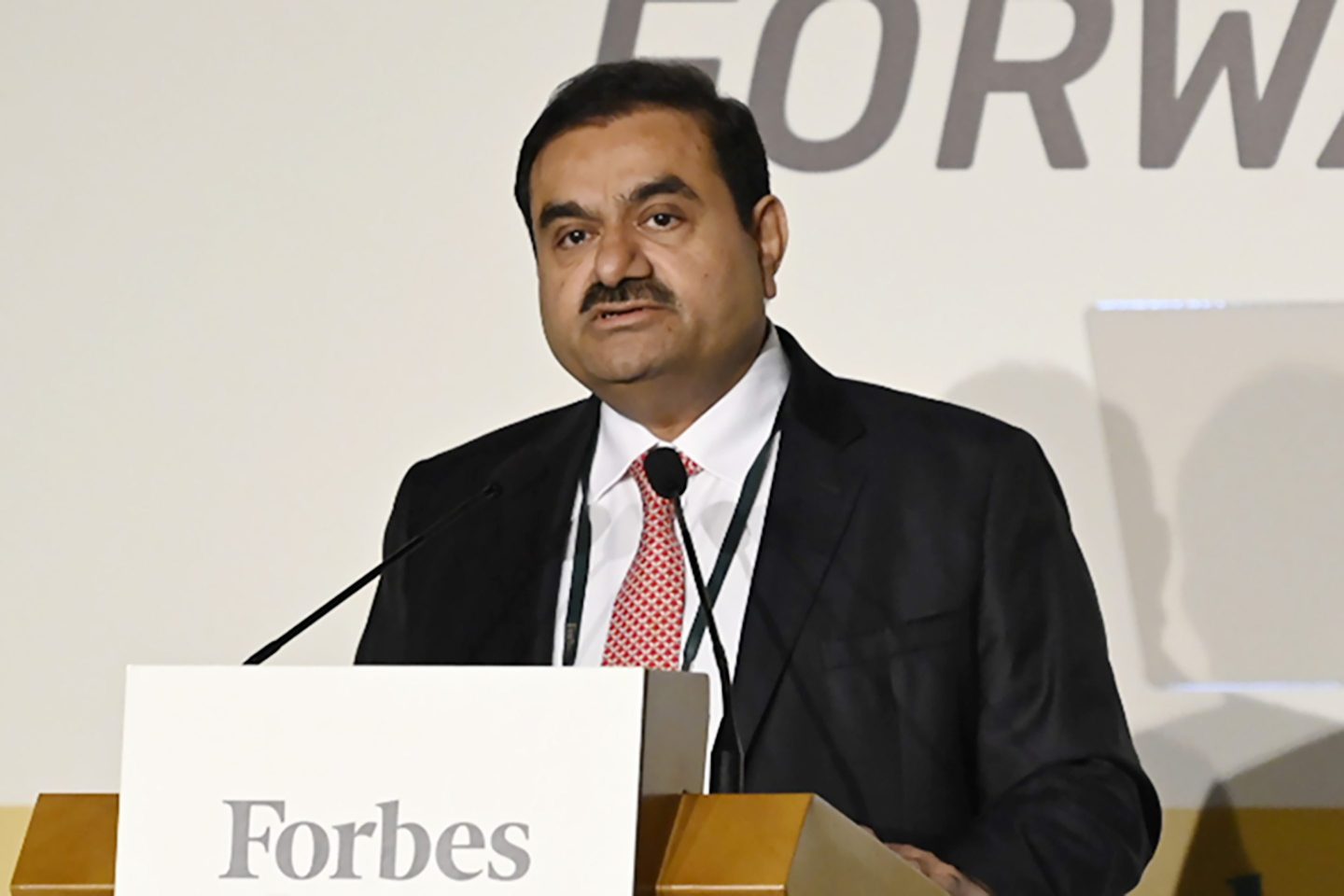 Gautam Adani speaking at a conference
