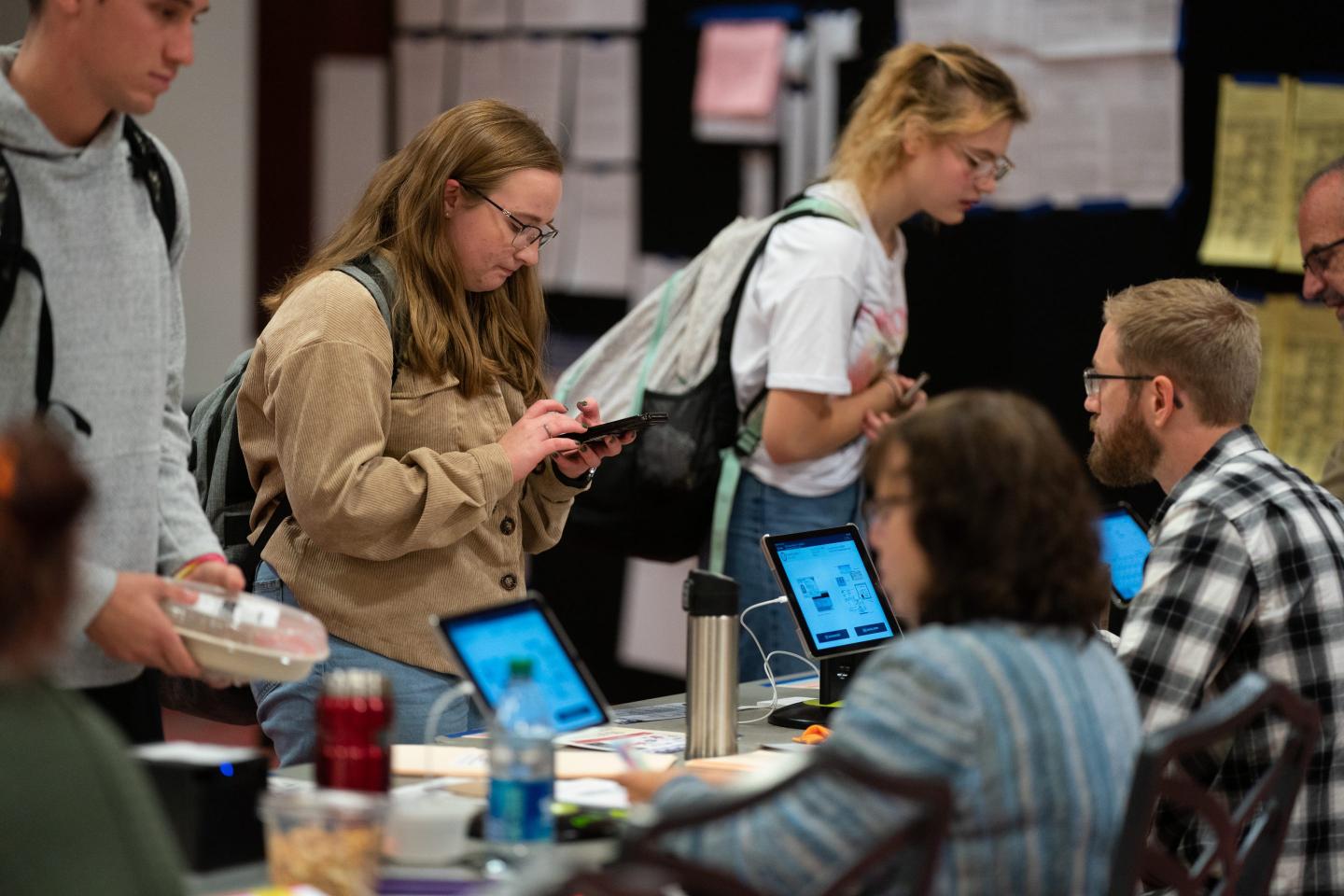 Young people voting.