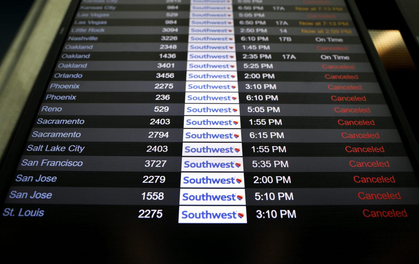 Canceled Southwest Airlines flights, as seen on a monitor at Los Angeles International Airport