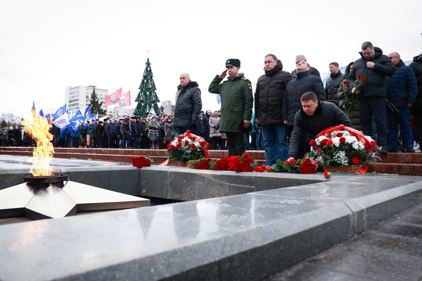 Mourners gather to lay flowers in Samara on January 3, 2023. in memory of Russian soldiers killed in a Ukrainian strike on Russian-controlled territory.