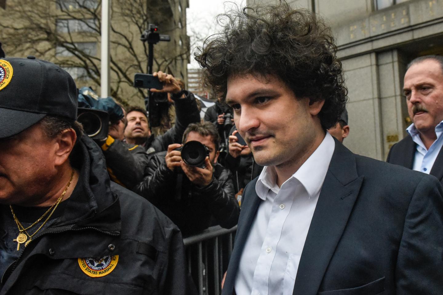 Sam Bankman-Fried leaving court