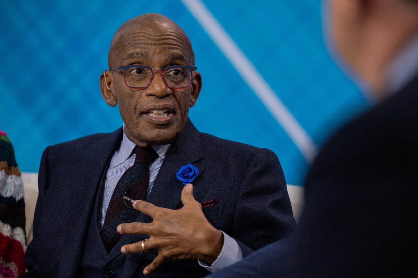 TODAY anchor Al Roker discussing his health recovery on the TODAY show wearing a blue suit.