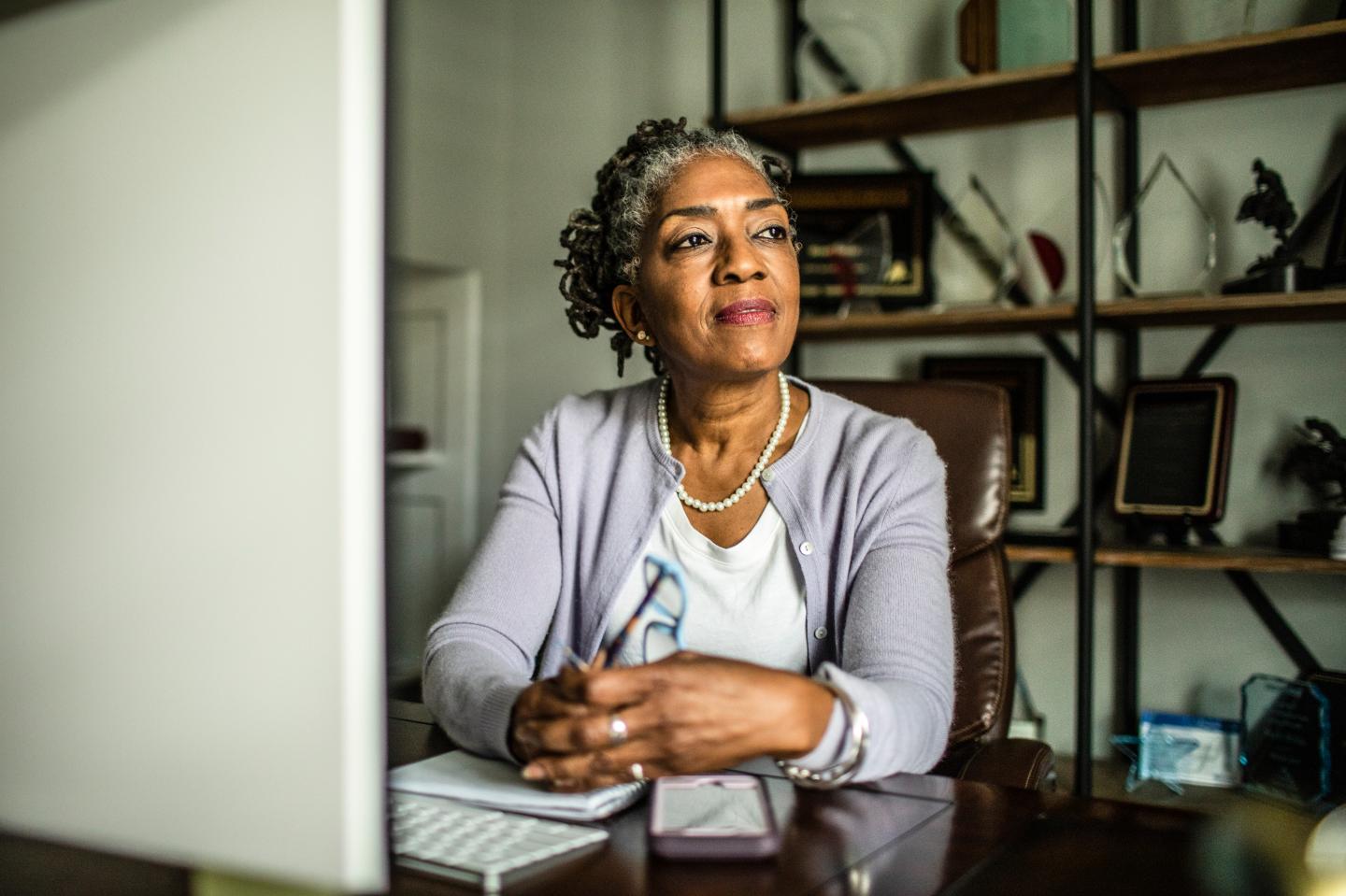 Black woman at desk