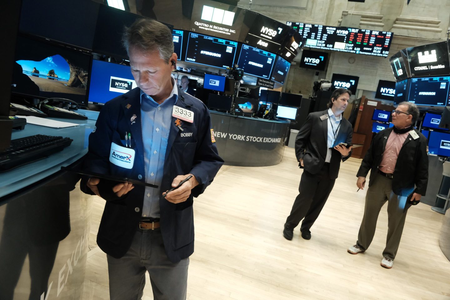 Traders work on the floor of the New York Stock Exchange (NYSE) on May 12.