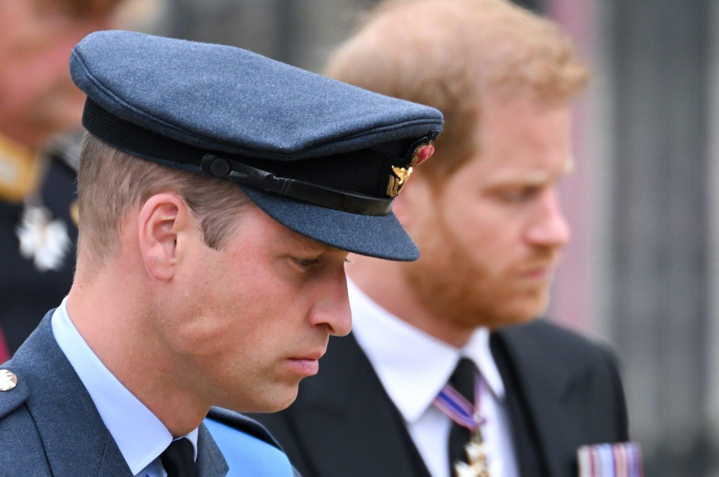 Prince William, Prince of Wales and Prince Harry, Duke of Sussex during the State Funeral of Queen Elizabeth II at Westminster Abbey