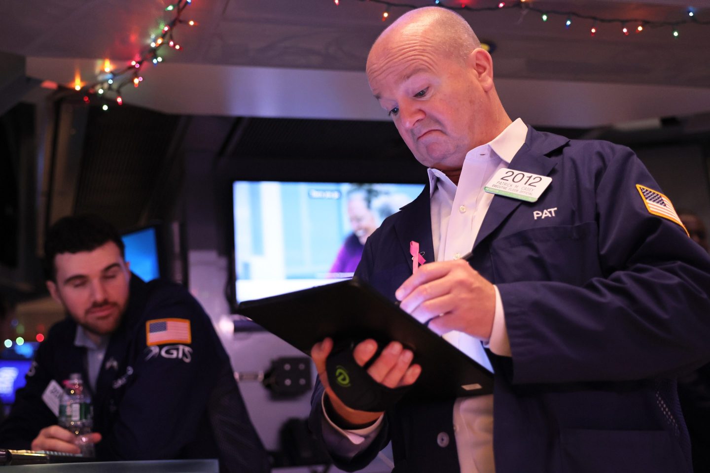 Traders work on the floor of the New York Stock Exchange on Wednesday.