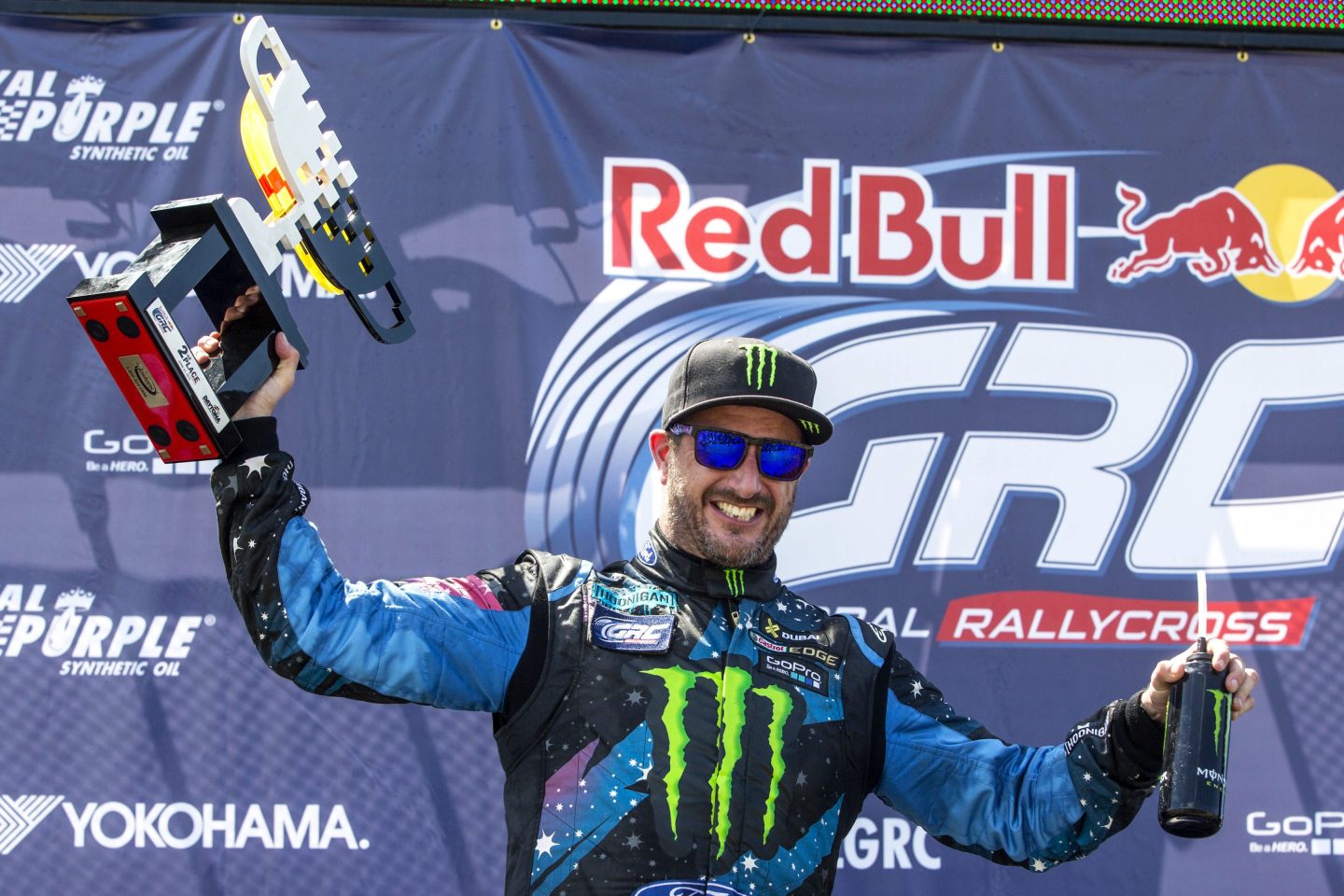 Ken Block holds a trophy at Daytona in 2015