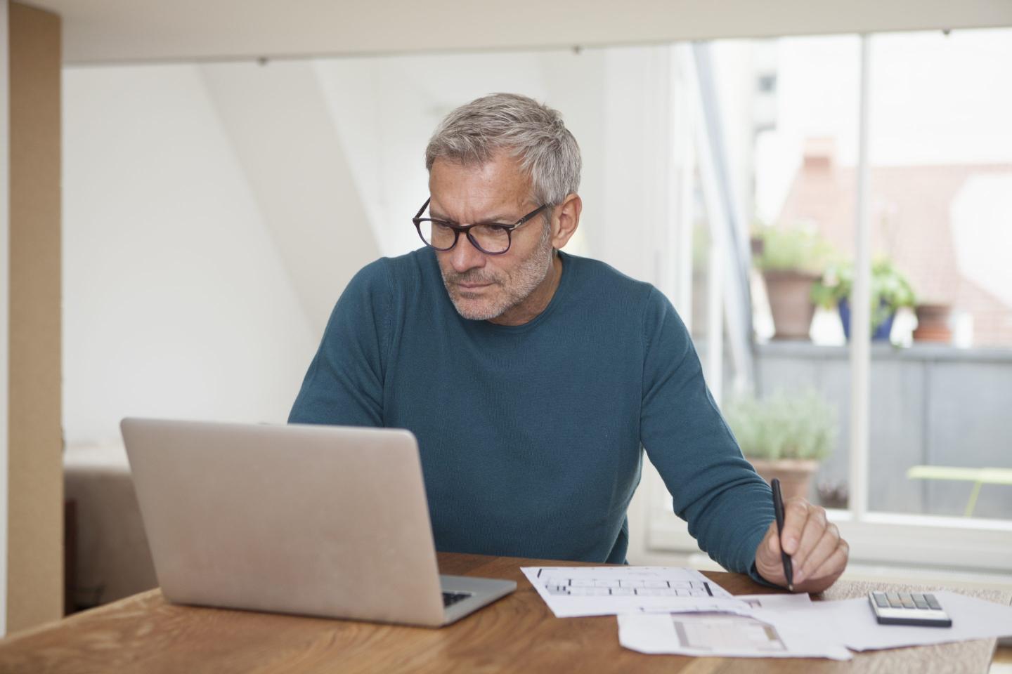 Man crunching numbers