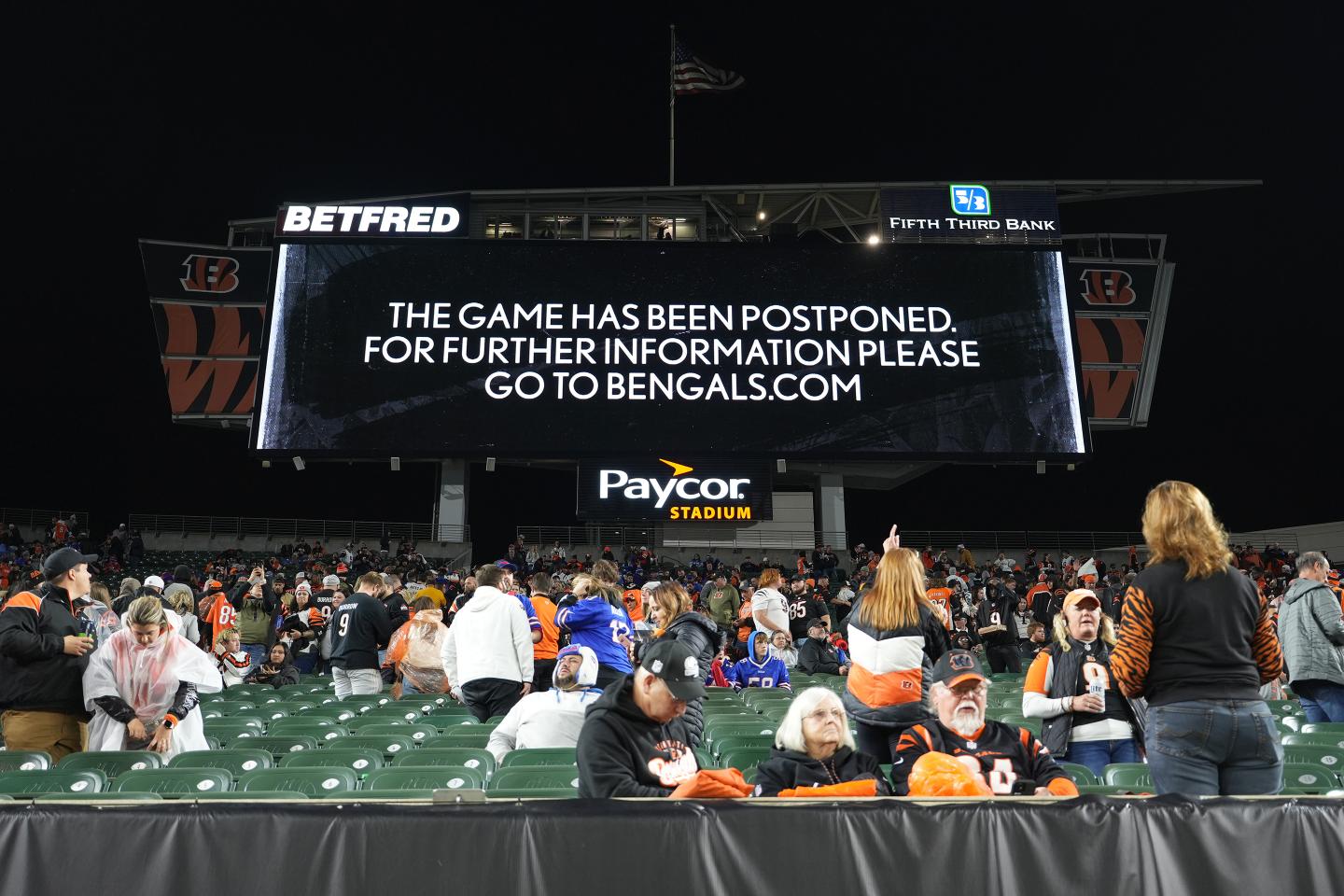 An announcement is displayed on the scoreboard as the game between the Cincinnati Bengals and the Buffalo Bills is postponed following the injury of Damar Hamlin #3 of the Buffalo Bills during the first quarter at Paycor Stadium.