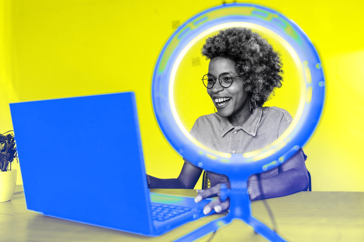Photo illustration of a woman using a ring light and a laptop at home.