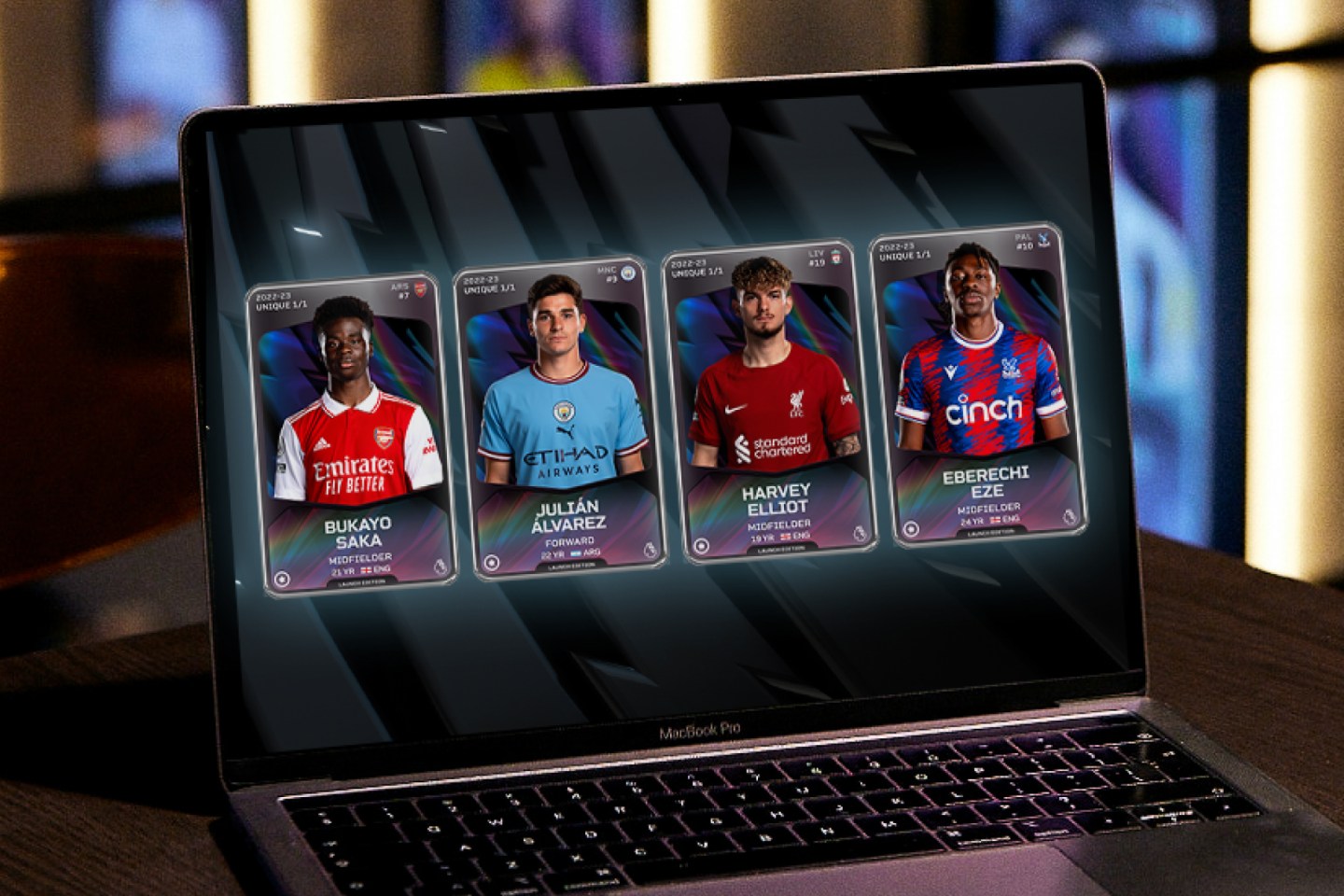 Premier League soccer players are seen on a computer.