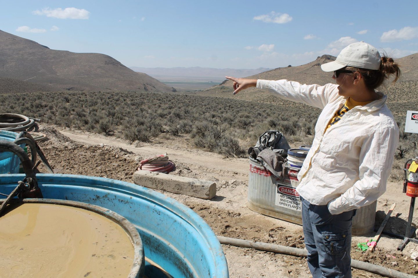 Melissa Boerst, a Lithium Nevada Corp. geologist, points to an area of future exploration from a drill site at the Thacker Pass Project in Humboldt County, Nev., on Sept. 13, 2018.