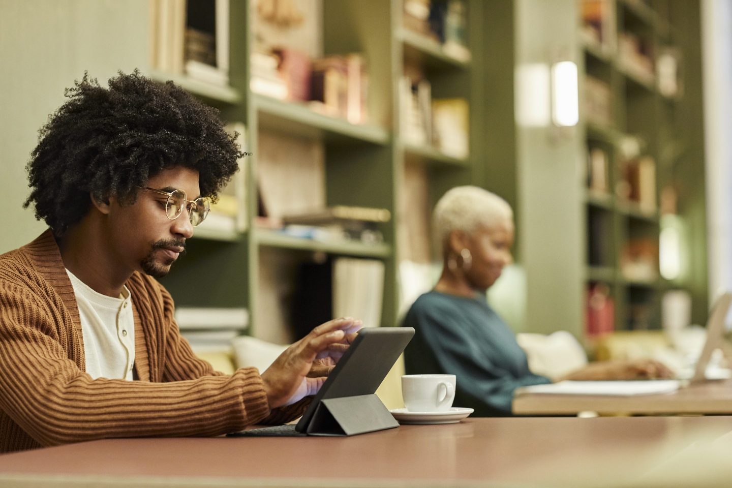Businessman using tablet PC in creative office