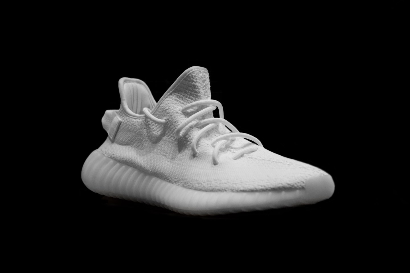 Adidas Yeezy 350 Boost in the "Cream White" or "Triple White" color way