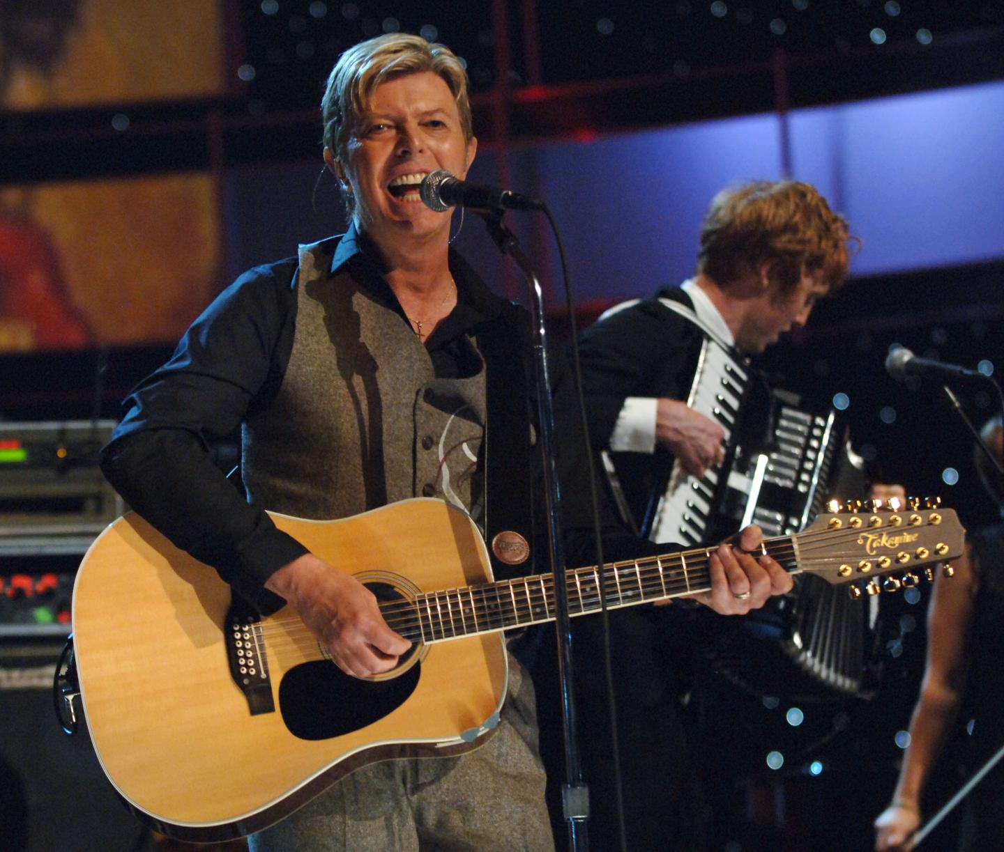 David Bowie’s ‘extraordinary’ archive, including a Ziggy Stardust jumpsuit and handwritten lyrics to ‘Heroes,’ gets a home