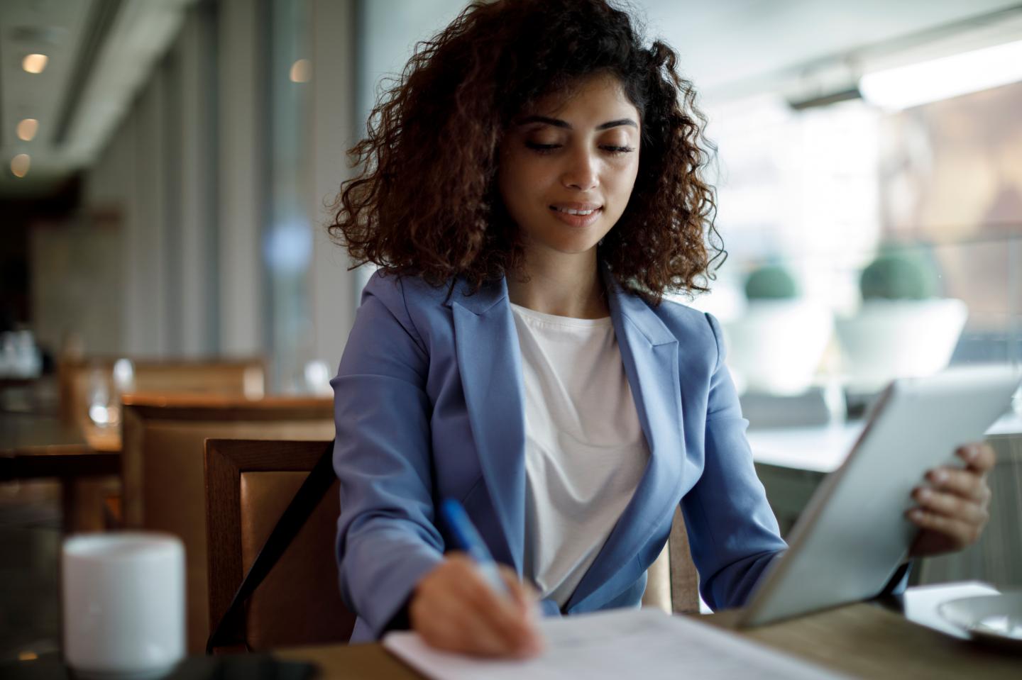 Businesswoman working at a cafe