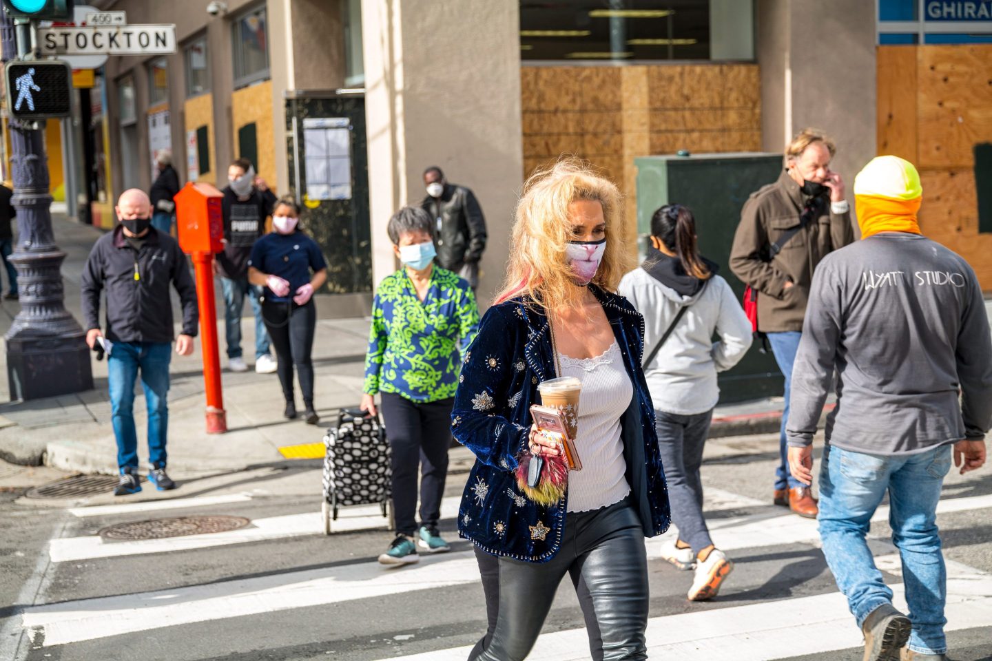 Pedestrians crossing the street in San Francisco.